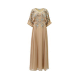 Front view of a SHAIRA nude-colored maxi kaftan featuring heavy silver and gold crystal floral embellishments on the bodice and butterfly sleeves.