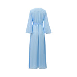 Rear view of a floor-length sky blue SHAIRA kaftan showing the flowing chiffon fabric, matching waist tie, and elegant drape of the bell sleeves.