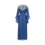 The back of the blue SHAIRA kaftan showing silver embroidery along the V-shaped back neckline and flowing butterfly sleeves.