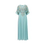 Front view of a SHAIRA light blue maxi kaftan dress featuring gold and silver leaf embroidery on the bodice and a V-neckline.