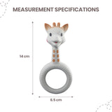 White Sophie La Girafe teether with orange ears, spots, black eyes, pink cheeks, and a textured ring.