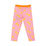 Pink leggings with yellow heart patterns on a white background
