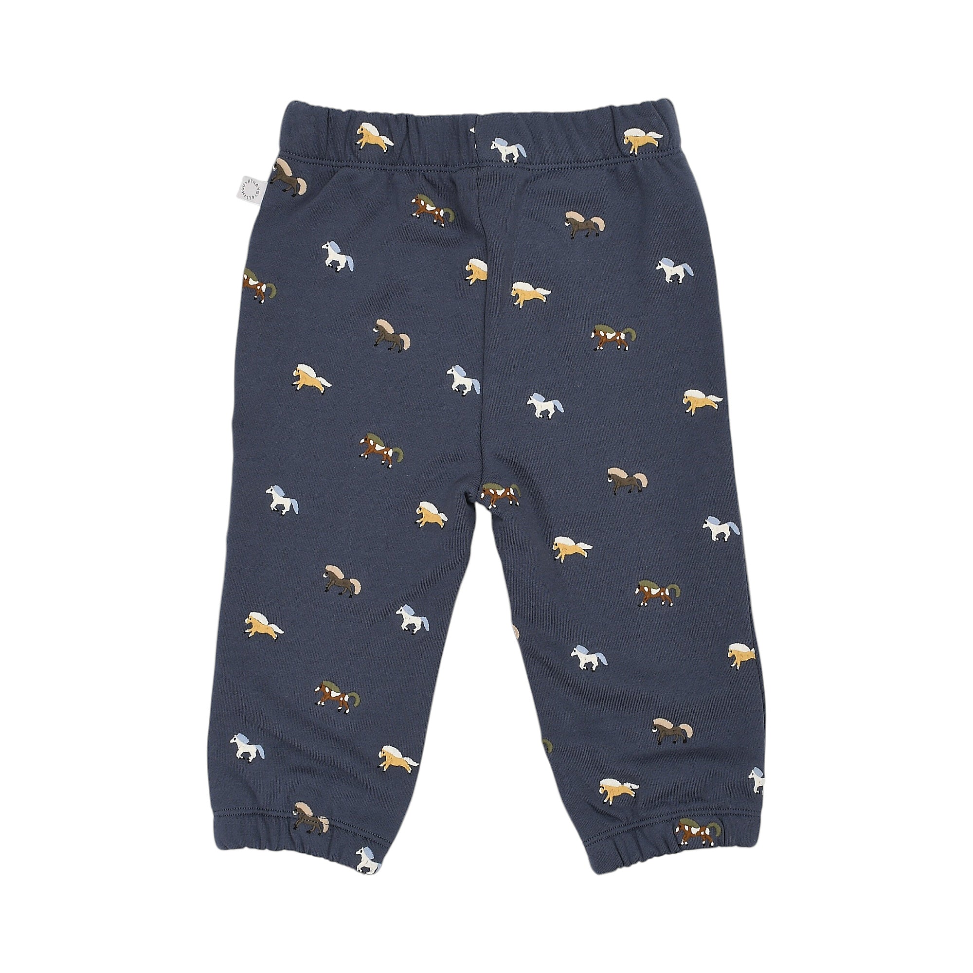 Navy blue jogging pants with an all-over print of small, colorful horses. Features an elasticated waistband and gathered ankl