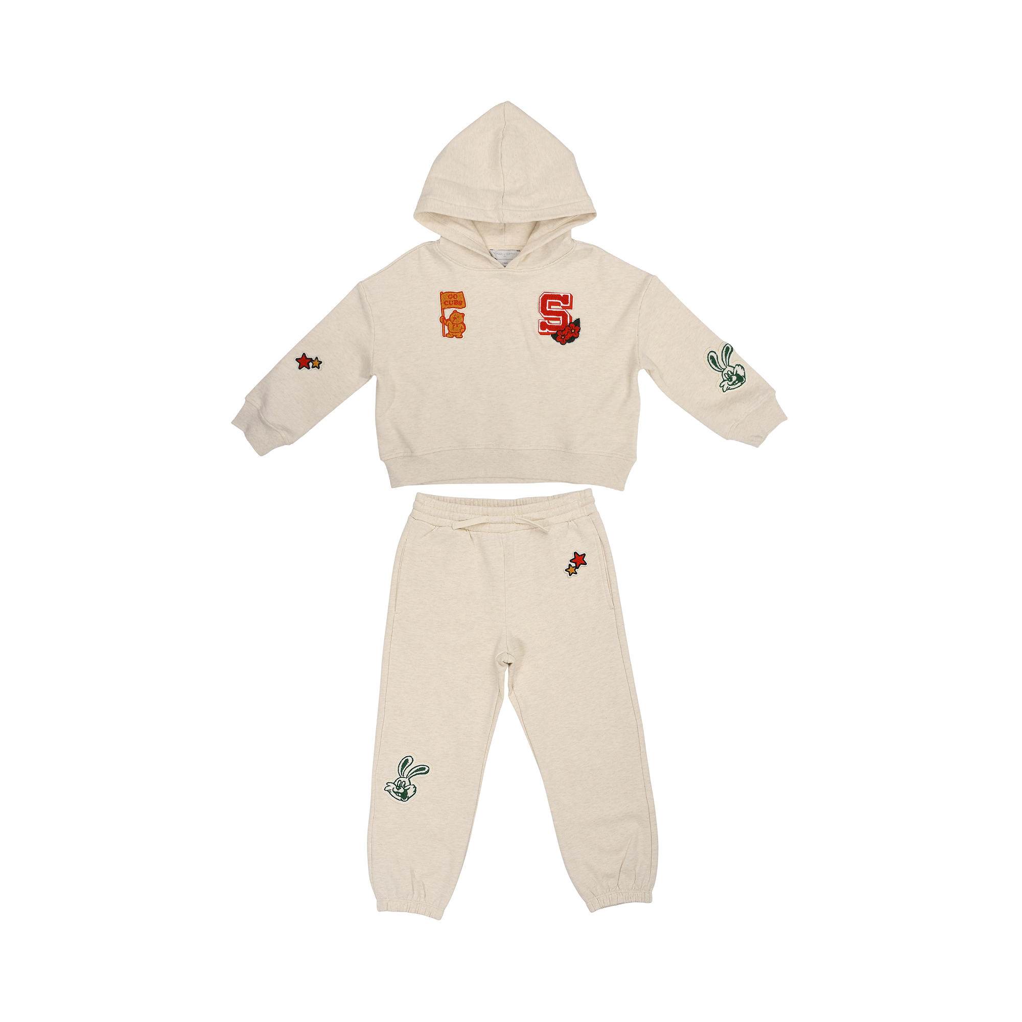 Beige marled jogging suit with a hooded top and joggers. The top has red 'S', 'Say nice' text, star, and rabbit patches. Jogg