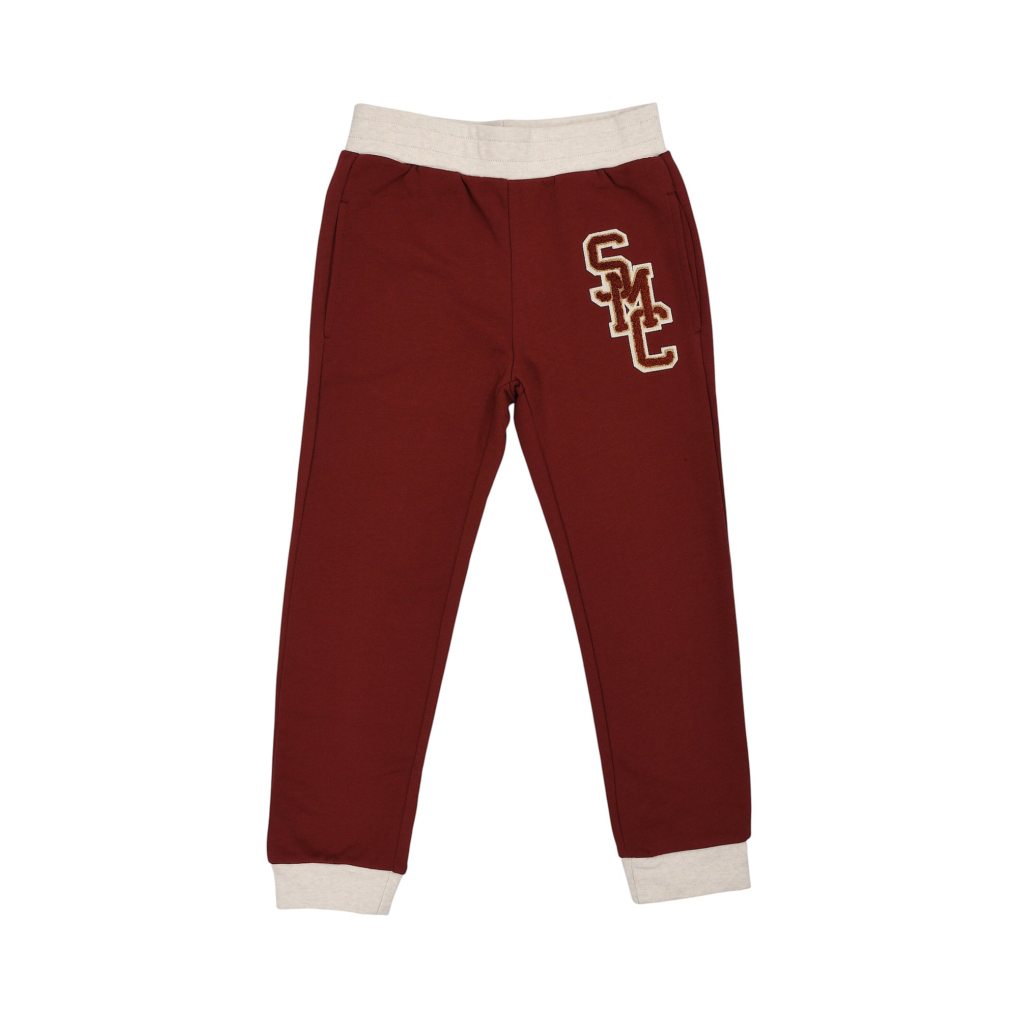 Burgundy jogging pants with a light beige ribbed waistband and cuffs. Features an embroidered gold-toned and burgundy 'SMC' l