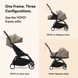 Black Stokke YOYO3 stroller frame with a curved design, black handle, and four wheels with white hubs.