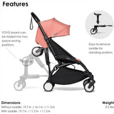 A black Stokke YOYO board with two white-rimmed wheels, attached to a black stroller. It has a removable T-shaped black saddl
