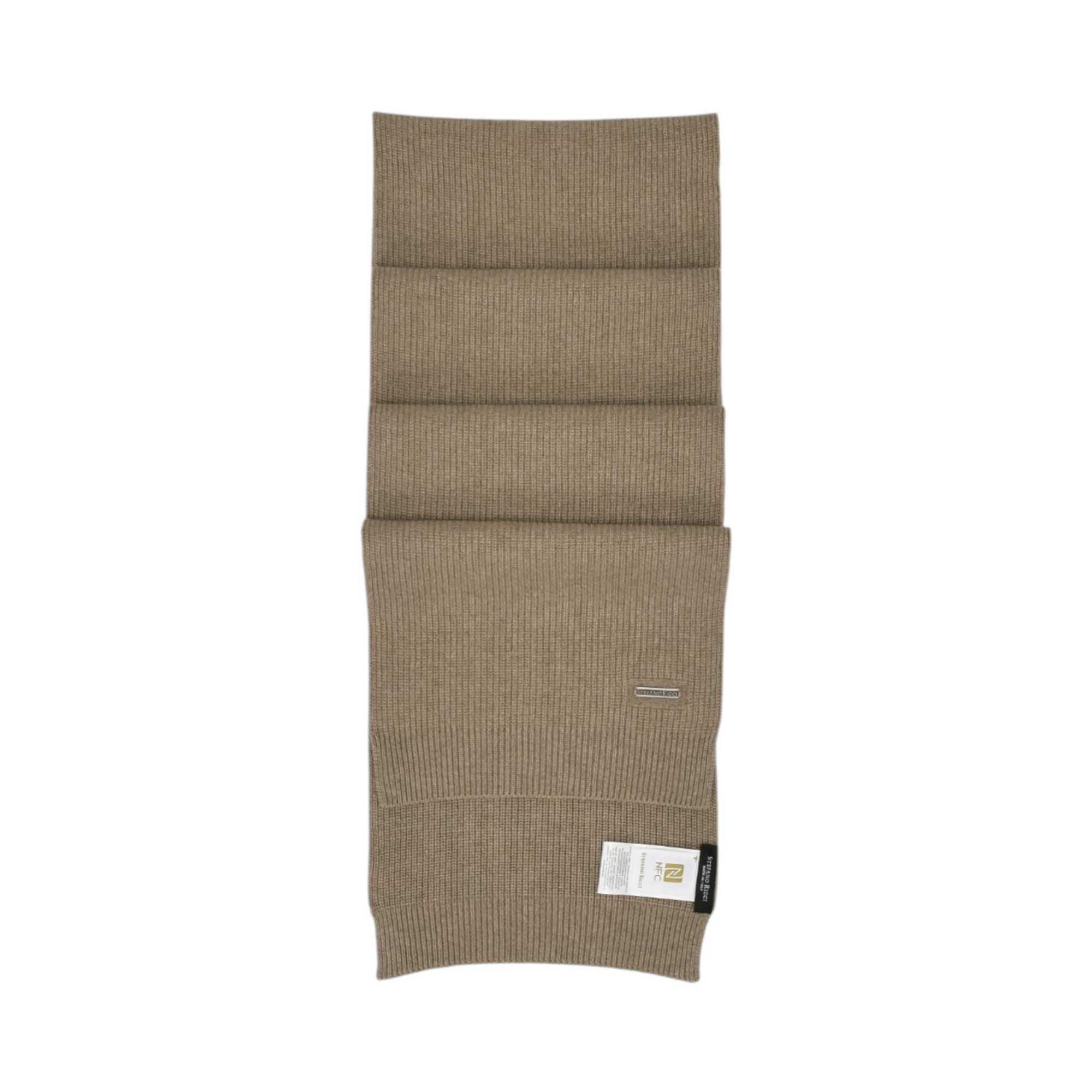 Beige rib-knit scarf, folded, with a small silver-toned metal tag and a white product tag.