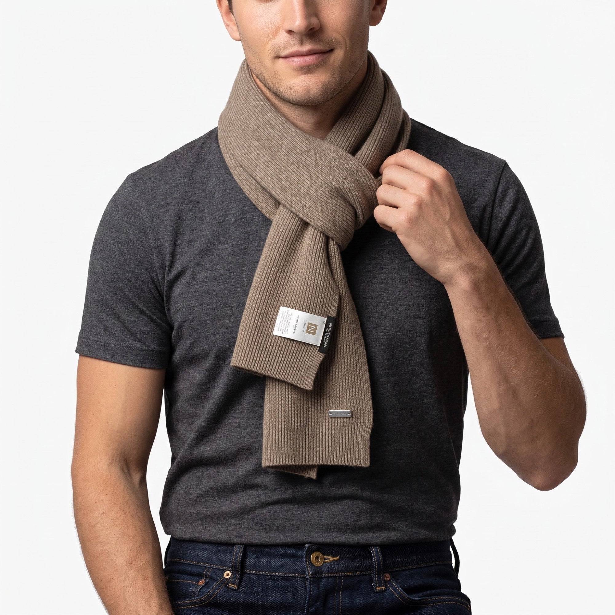 Beige rib-knit scarf with a silver-toned metal tag and brand labels on one end.