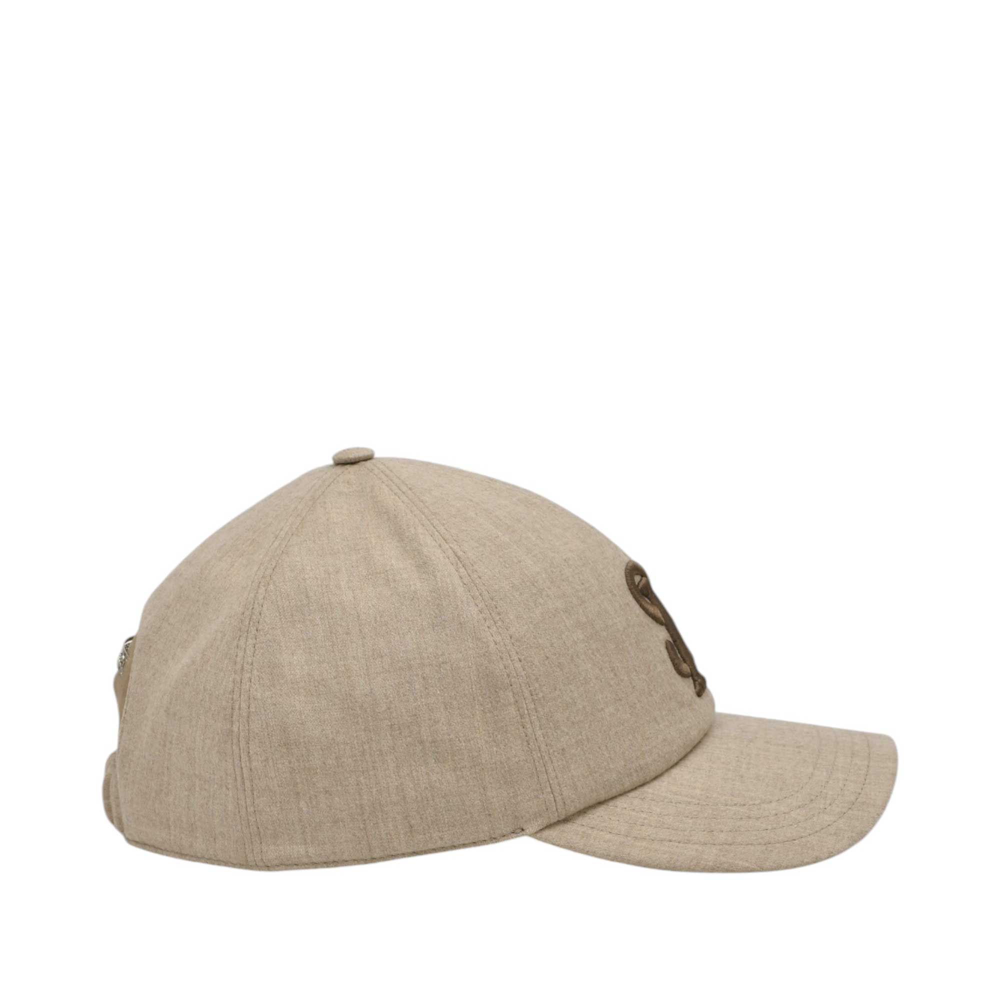 Beige baseball cap with a curved brim, brown embroidered logo on front, and silver-toned buckle closure at back.