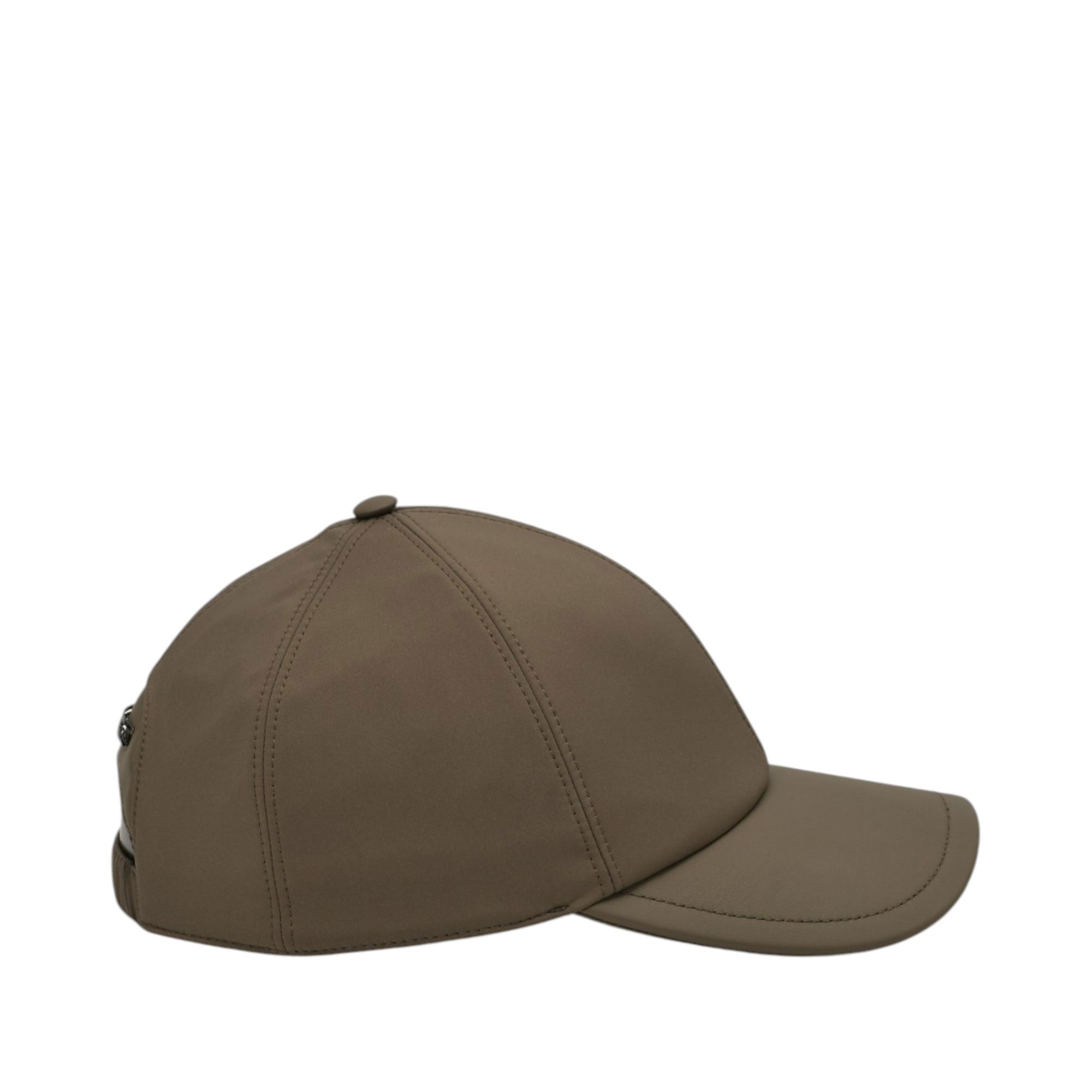 Taupe baseball cap with a curved brim, six-panel crown, top button, and an adjustable strap with a dark metal clasp at the ba