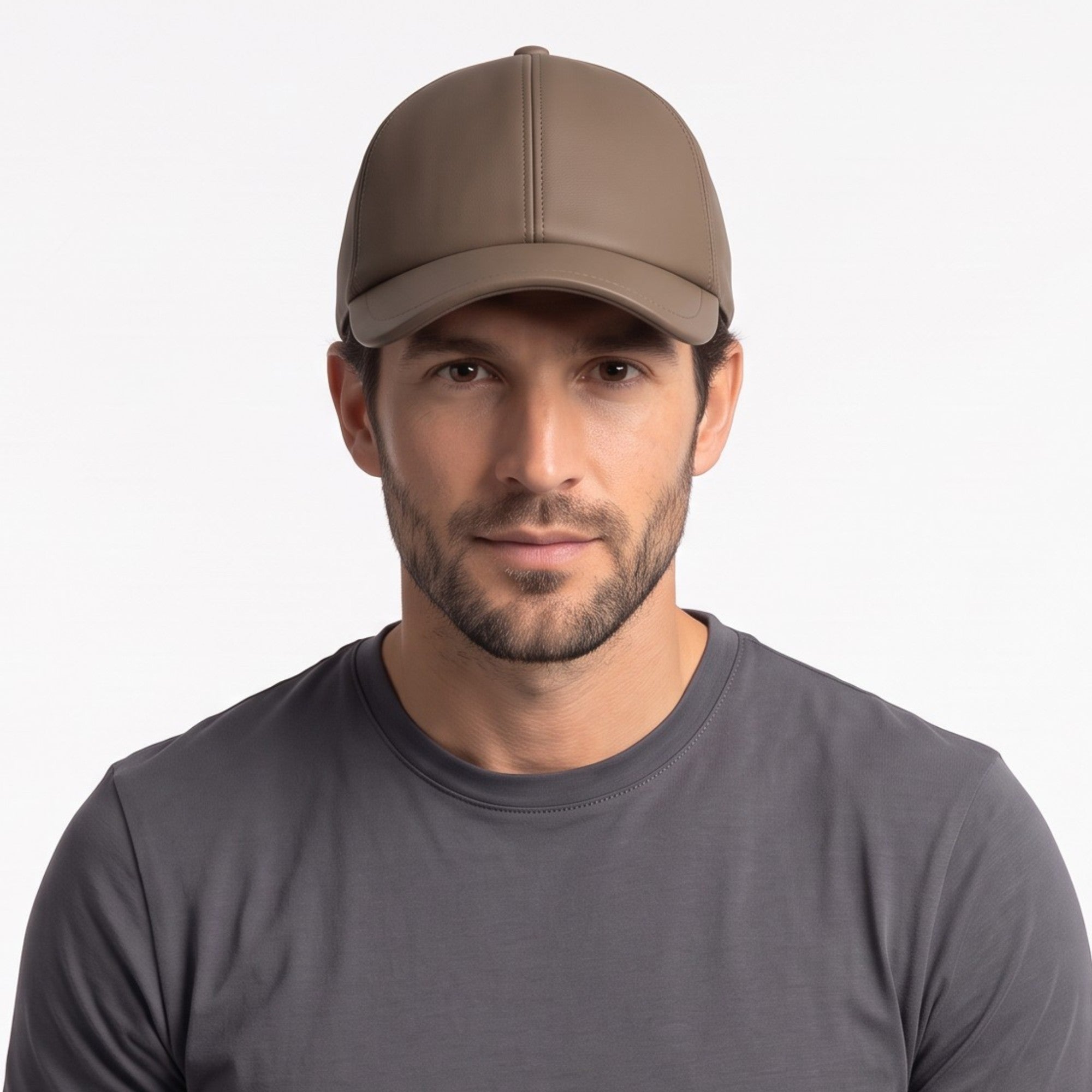 Taupe baseball cap with a smooth, leather-like finish, structured crown, and curved brim. Features visible panel seams and a