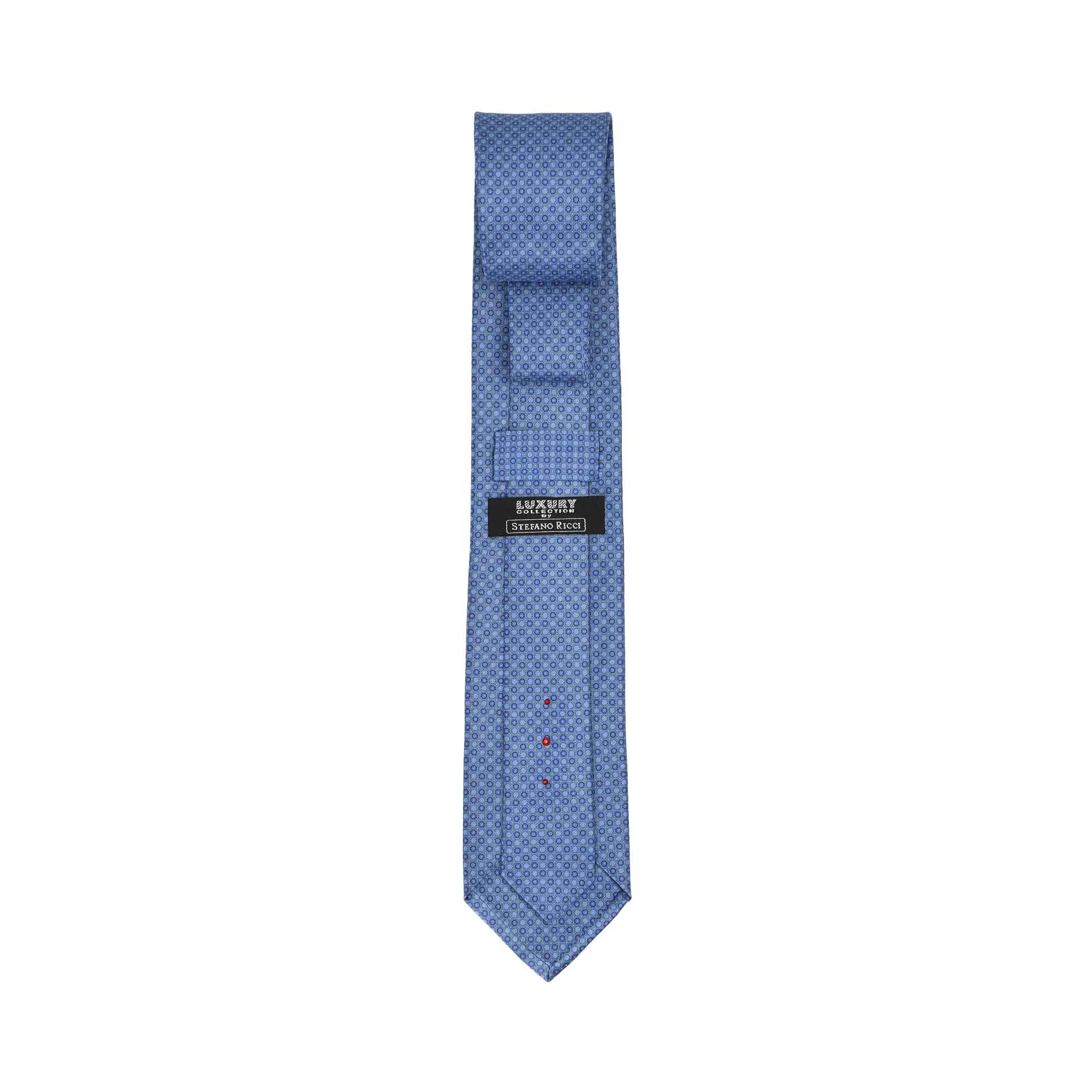 Blue tie with a subtle geometric pattern, a black 'Stefano Ricci' label, and two small red stitches.
