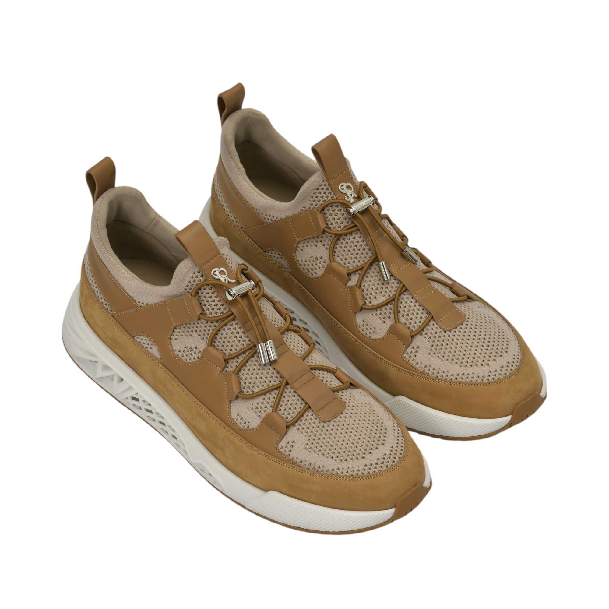 Pair of brown and beige mesh sneakers with unique strap lacing, silver-toned toggles, and white textured soles.