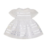 White baby dress with rounded collar, sheer puffed sleeves, and horizontal white satin ribbon embellishments on bodice and sk