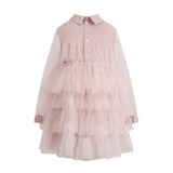 Pink long-sleeved dress with a collared shirt-style bodice, button-front, sheer sleeves, tiered ruffled tulle skirt, and a de