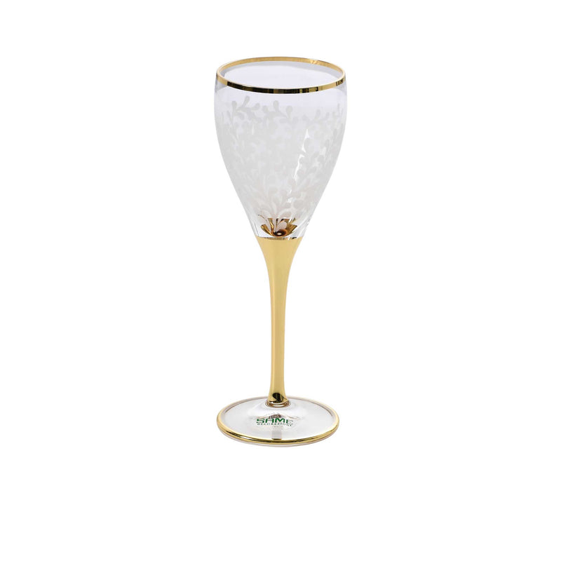 A single elegant wine glass featuring a frosted white leaf pattern on the bowl and a solid 24k gold-finished stem and base.
