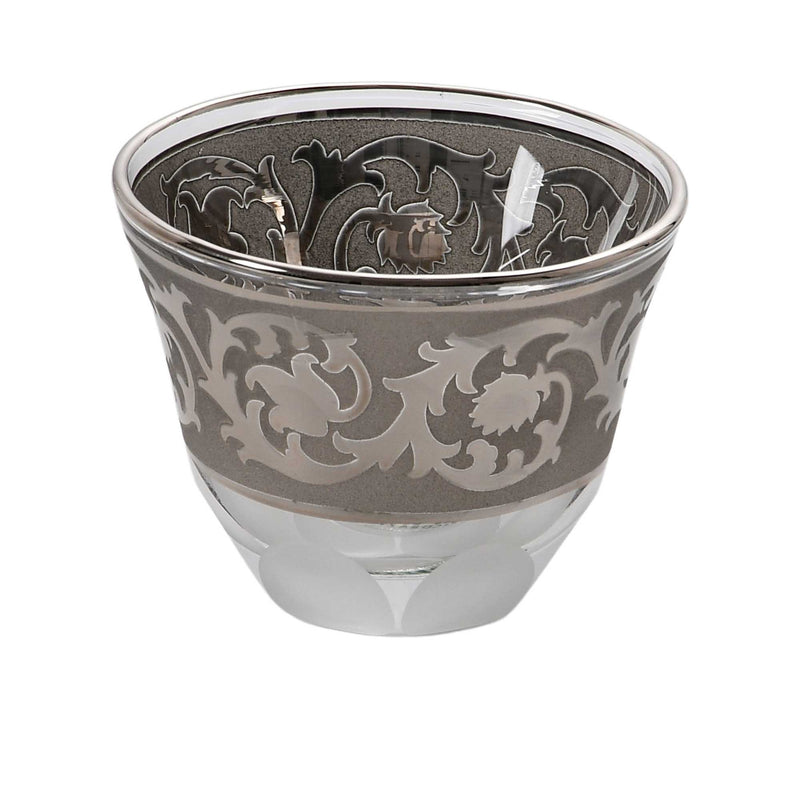 A single crystal cup featuring a wide band of hand-painted silver scrollwork and a shimmering platinum-toned rim.