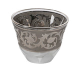 A single crystal cup featuring a wide band of hand-painted silver scrollwork and a shimmering platinum-toned rim.