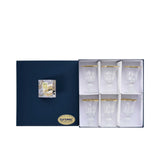 A set of six SAME Decorazione stemmed glasses arranged neatly in a luxury navy blue presentation box.
