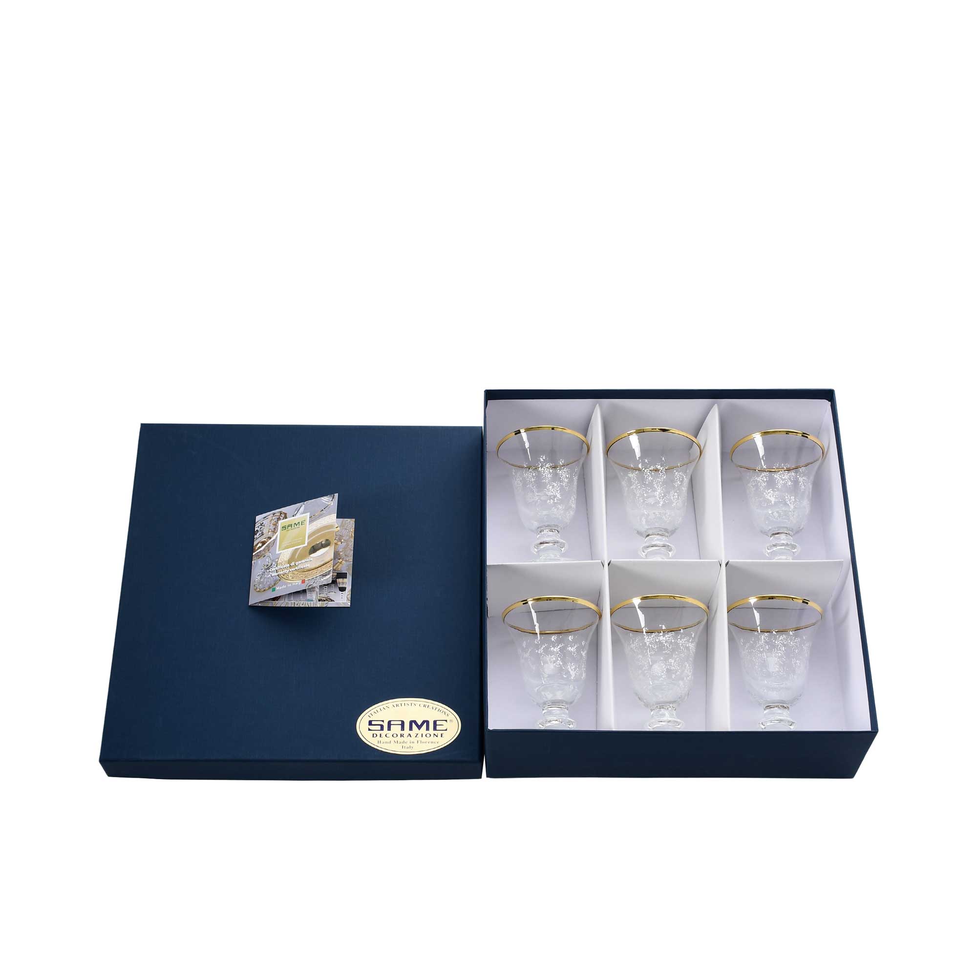 Overhead shot of the six-piece Italian crystal set in its protective gift packaging, featuring the brand's gold seal of authenticity