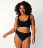 Second Front view of model wearing the Sloggi Ever Ease black Tai panty, showcasing the high-cut leg and smooth, soft fabric texture. Available for Online Purchase