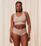 Second Model full front view of the Triumph Flex Smart beige maxi panty, showing the high-waisted design and smooth, neutral stretch fabric. Available for Online Purchase
