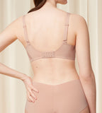 Second model back view of the Triumph Fit Smart beige non-wired bra, highlighting the stretchable lace design and adjustable straps with back closure. Available Online Now