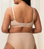 Second model back view of the Triumph Modern Lace+Cotton beige non-wired bra, showcasing the adjustable straps, back closure and decorative floral lace. Shop the Latest Online