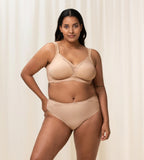 Second model full front view of the Triumph Modern Lace+Cotton beige non-wired bra, showcasing the cotton cups and decorative floral lace. Shop the Latest Online