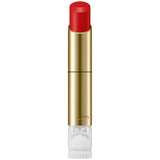 Red lipstick with gold casing on a white background.