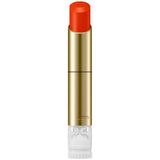 Lipstick with gold casing and red lipstick on a white background.