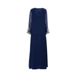 A Back View photo of a midnight blue SHAIRA jalabiya featuring elaborate silver floral embroidery down the center and on the sleeve cuffs. The dress is made of lightweight chiffon with long sleeves and a V-neckline.