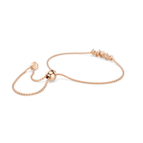 A side perspective view of the Swarovski Mesmera bracelet, highlighting the smooth sliding ball adjuster mechanism and the dimensional profile of the central crystal settings.