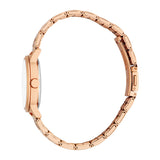Side perspective profile view of the Esprit watch, highlighting the slim 8mm curvature of the rose gold-plated watch housing, the low-profile adjustment crown, and the fluid assembly of the metal link band.