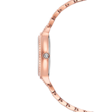 A crisp side profile view of the Swarovski Imber watch case, displaying the polished rose gold-tone finish, the sleek silhouette of the watch head, and the clear crystal embedded into the setting crown.