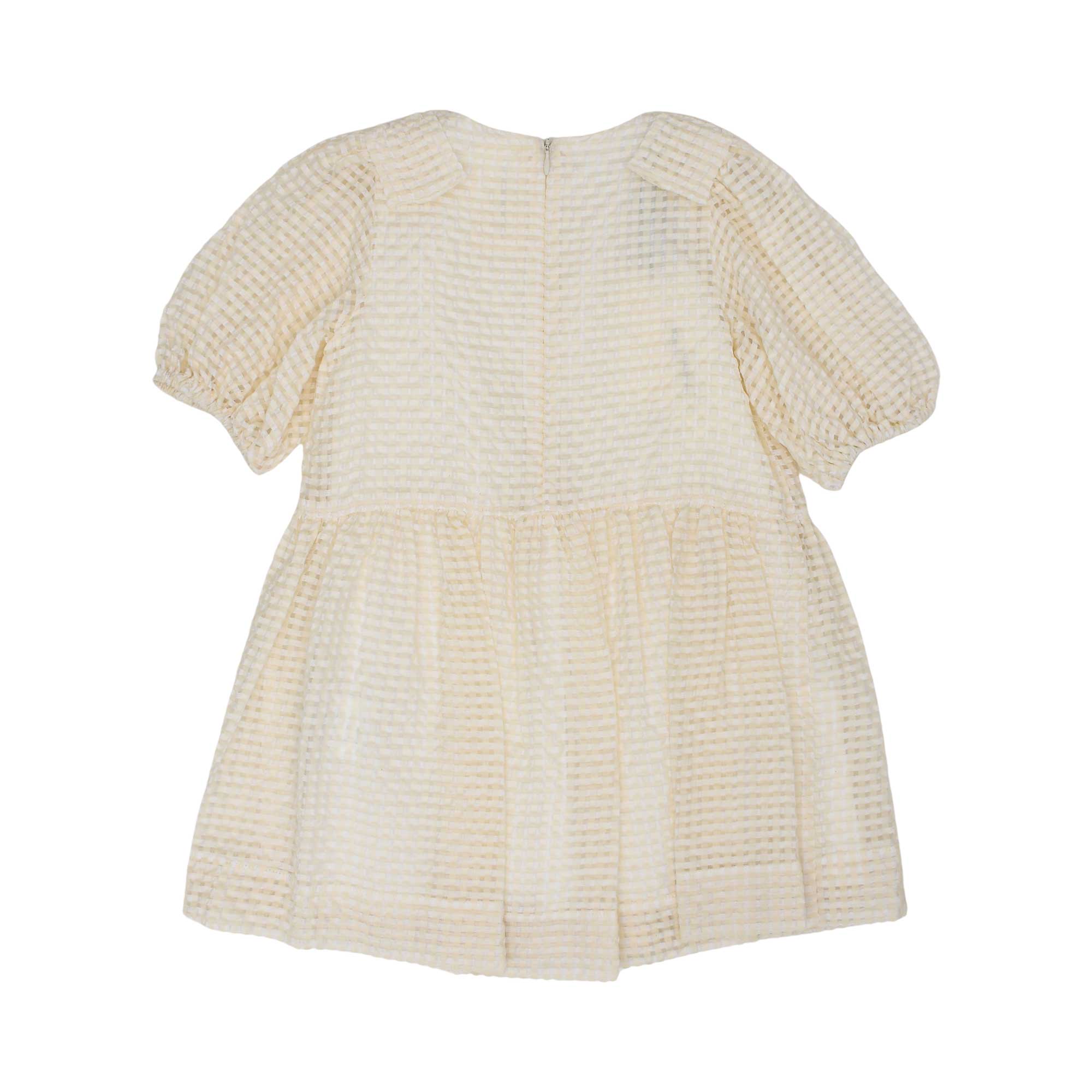 Back view of the Simonetta cream checkered dress showing the gathered waistline and concealed zipper fastening.
