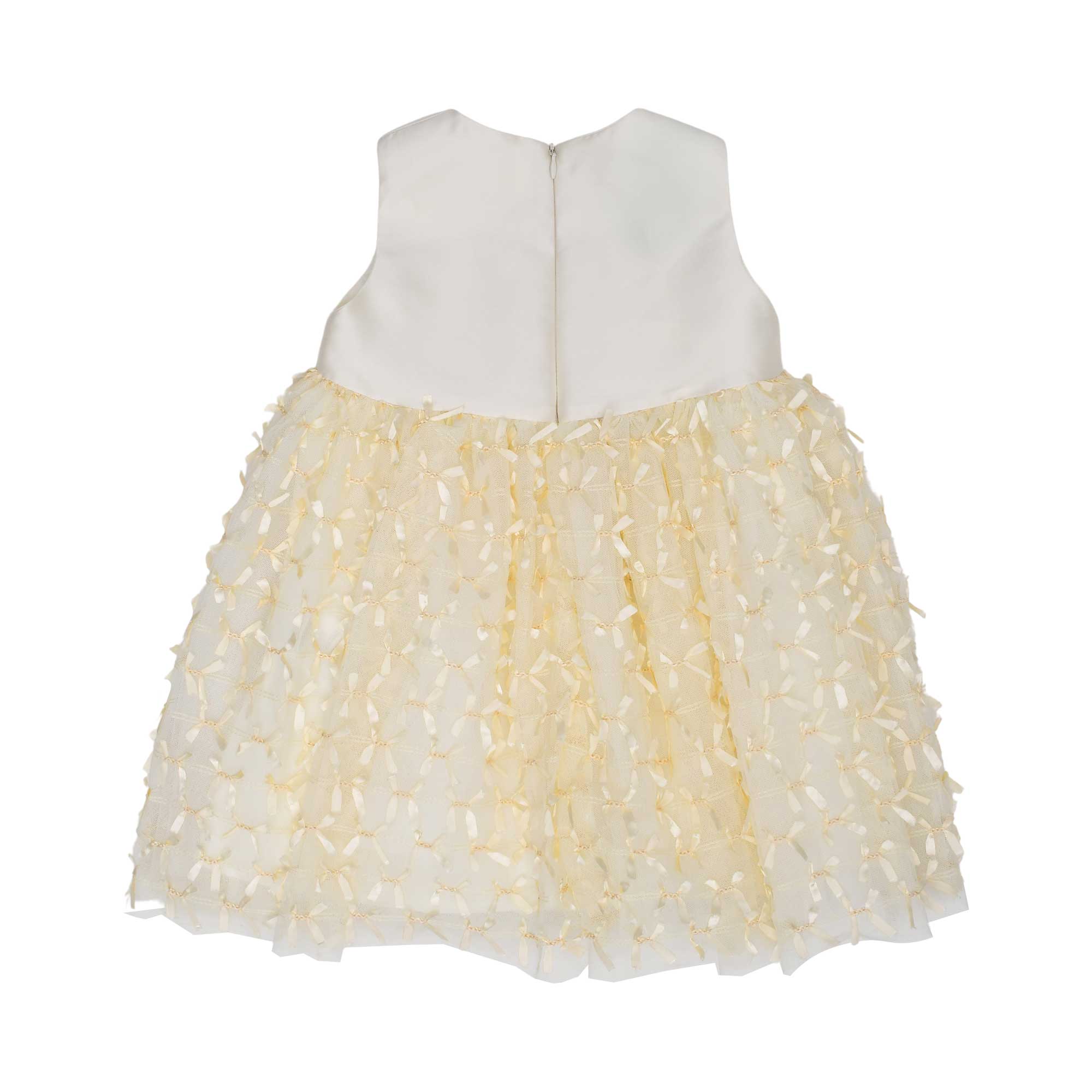 Back view of the Simonetta bow-covered dress showing the smooth satin back and the concealed zipper closure.