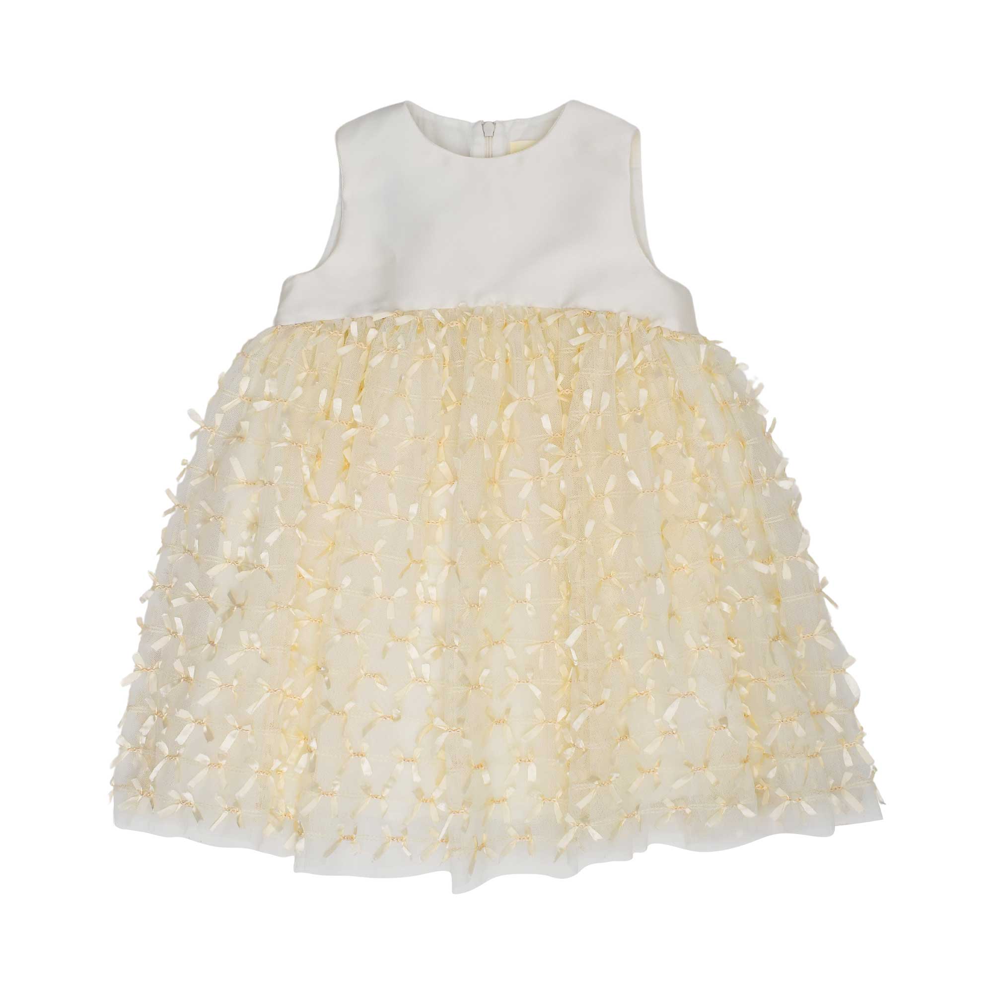 Front view of a Simonetta sleeveless dress for girls with an ivory satin bodice and a cream tulle skirt covered in hundreds of tiny 3D satin bows.