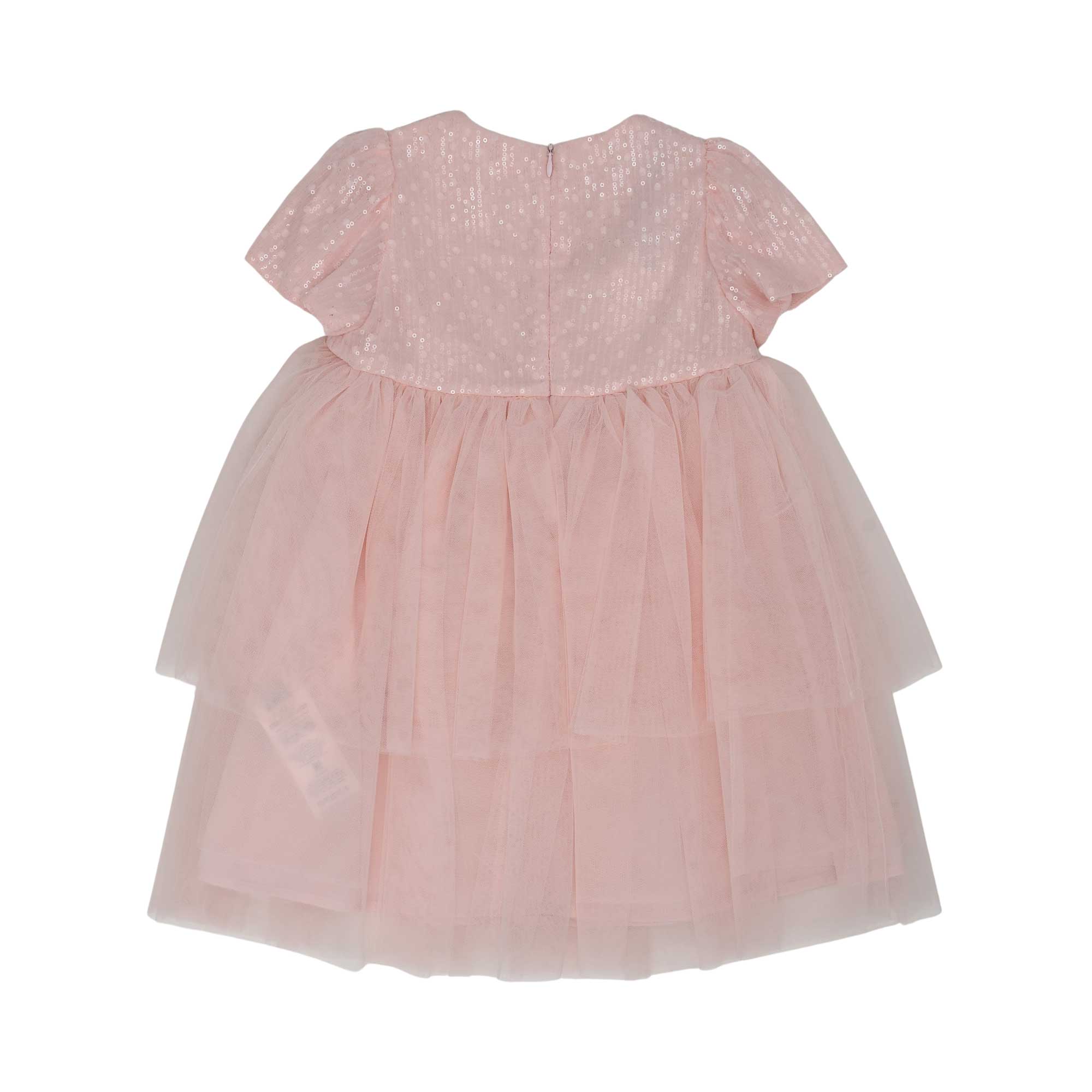 Back view of the Simonetta pink tulle dress showing the tiered layers and a concealed central zipper.