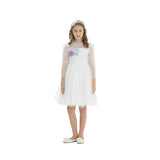 Young girl wearing an ivory white tulle occasion dress with colorful floral embroidery and sheer long sleeves against a white background.