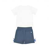 Back flat-lay view of the Stella McCartney Kids organic cotton baby boy set showing the plain white back of the t-shirt and the blue shorts with a rear patch pocket and side 3D fins.