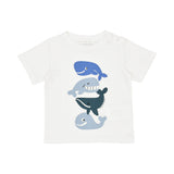 Flat lay of the Stella McCartney Kids off-white organic cotton infant crewneck t-shirt featuring a colorful graphic stack of four cartoon blue whales.