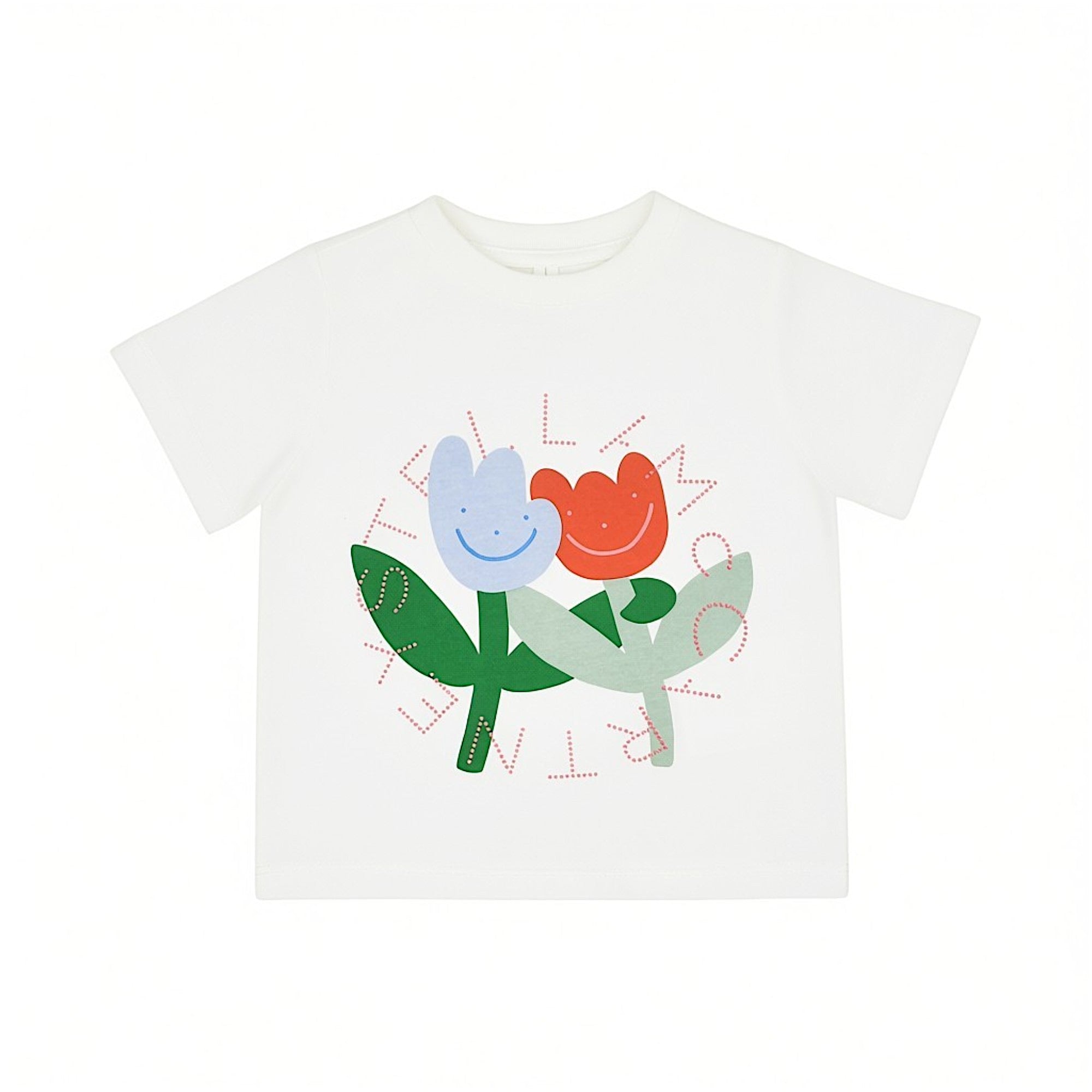 Front close-up view of a white Stella McCartney Kids baby t-shirt featuring a graphic of a blue and a red smiling tulip with green stems, encircled by pink stitched lettering spelling out the brand name.