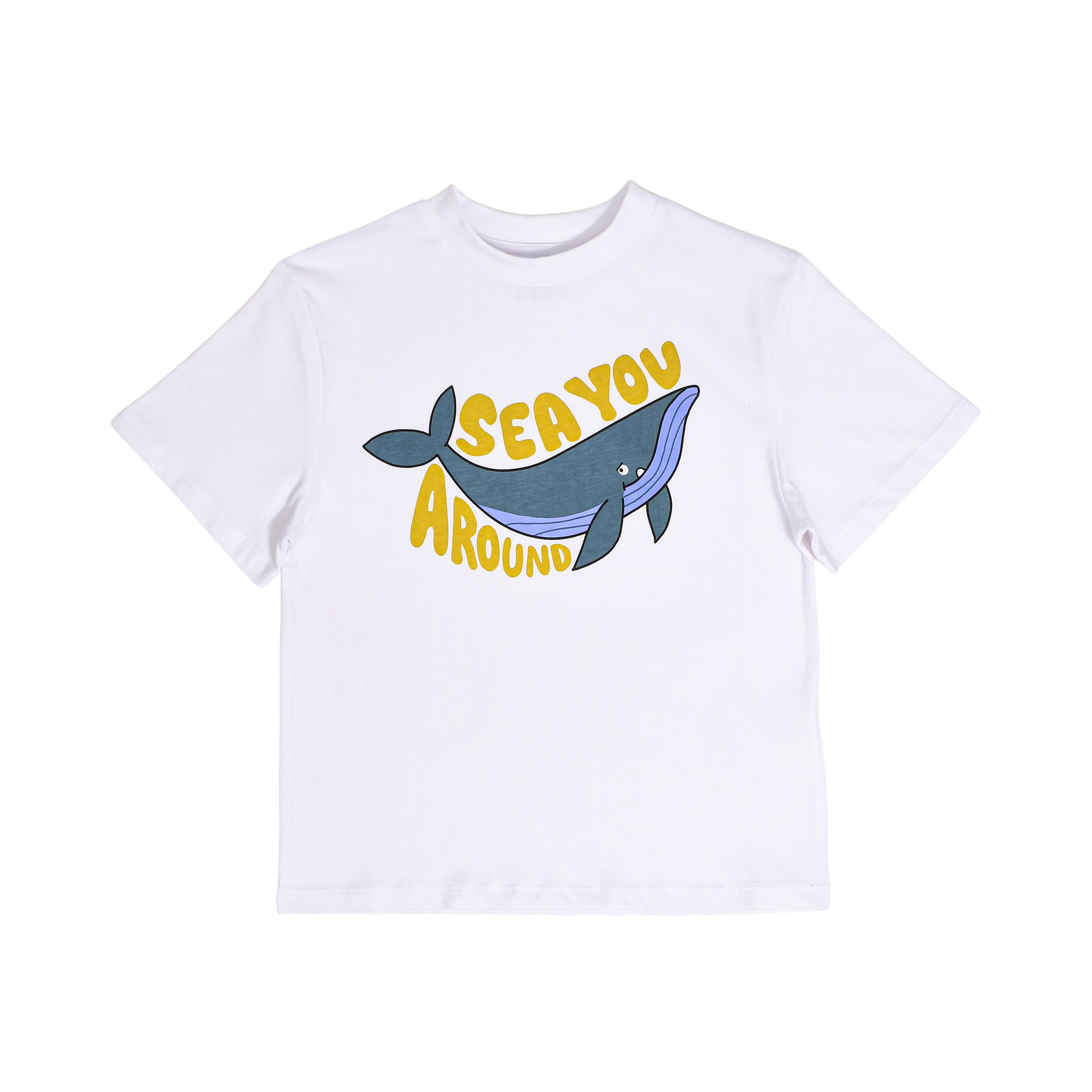 Front close-up of a white Stella McCartney Kids organic cotton toddler t-shirt with a blue cartoon whale graphic and yellow text reading "Sea You Around."