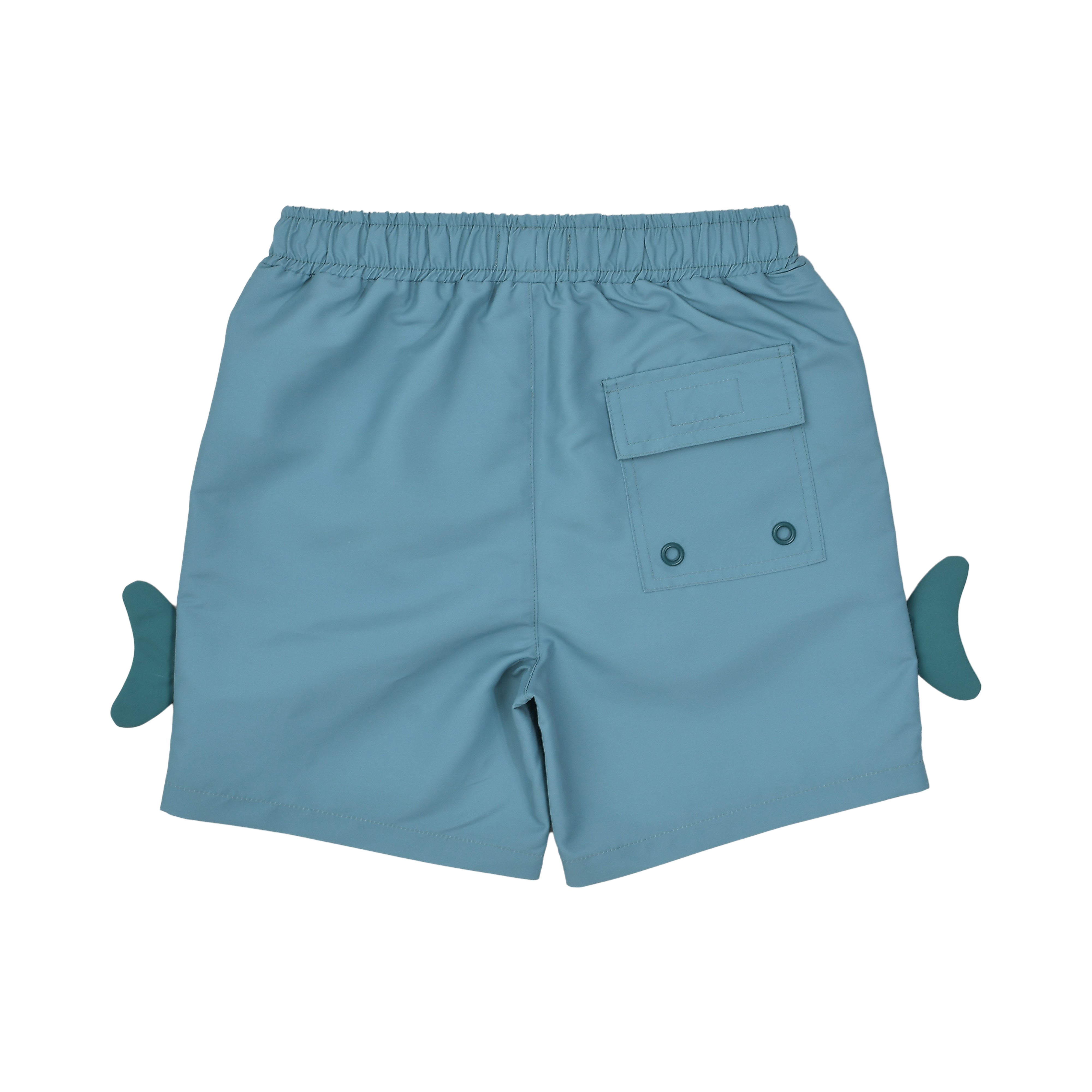 Back view of the Stella McCartney Kids teal toddler shorts showing the elastic waist, structural stitching, and back flap pocket with dual drainage eyelets.