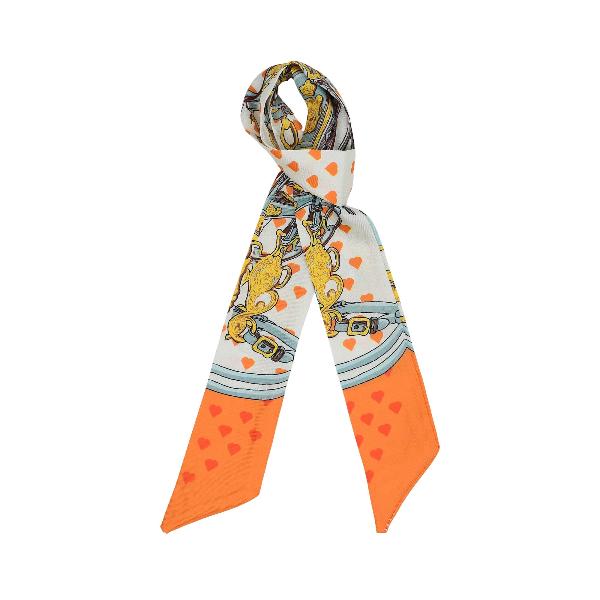Styled View of the Muni women’s multicolor twilly scarf with orange heart motifs and equestrian print. Now Available Online