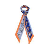 Styled view of the Muni Women’s Blue/Orange Multicolor Printed Twilly Scarf, a refined printed accessory. Available Online