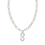 Swarovski Dextera Strandage Round Cut White Mixed Metal Necklace with a 'S' pendant on a white background