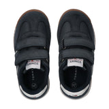 Navy blue low-cut sneakers with two velcro straps, white sole stripes, and brown outsoles. White Tommy logo on tongue.
